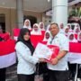 Sambut HUT Ke-81 RI, Pemkab Nagan Raya Bagikan Ribuan Bendera Merah Putih
